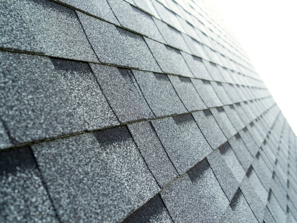 selective focus of new asphalt shingle roof